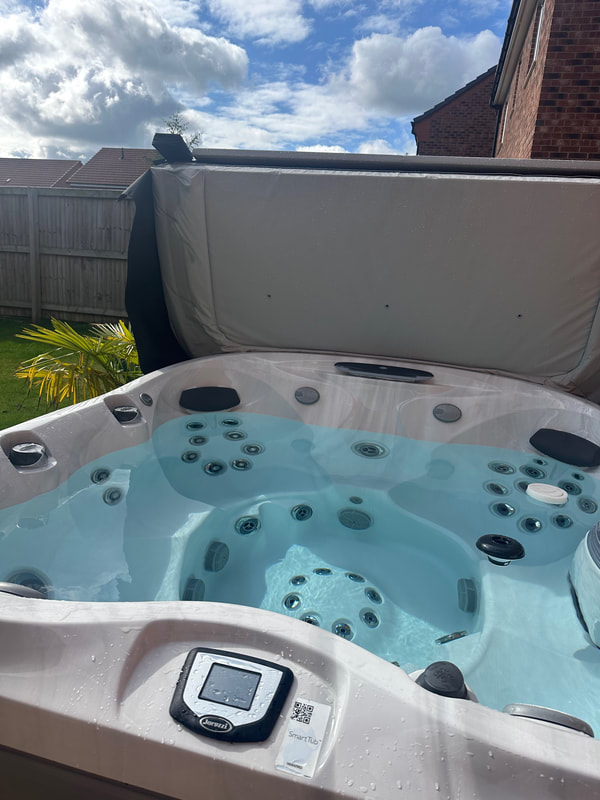 preowned jacuzzi hot tub for sale