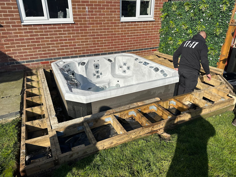 sunk in decking hot tubs